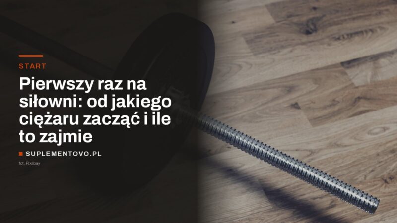 Gryf sztangi z jednym nałożonym talerzem leżący na drewnianej podłodze