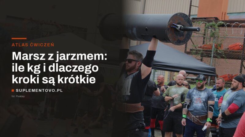 Zawodnik wyciska kłodę nad głowę podczas zawodów strongman